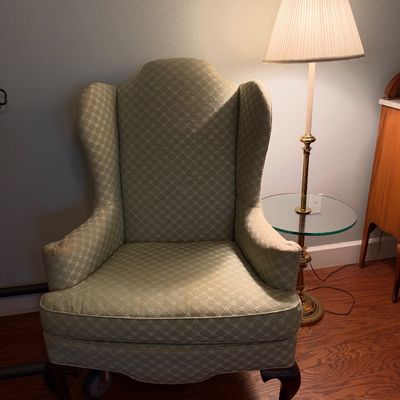 Sale Photo Thumbnail #101: Traditional wingback armchair upholstered in a sage green