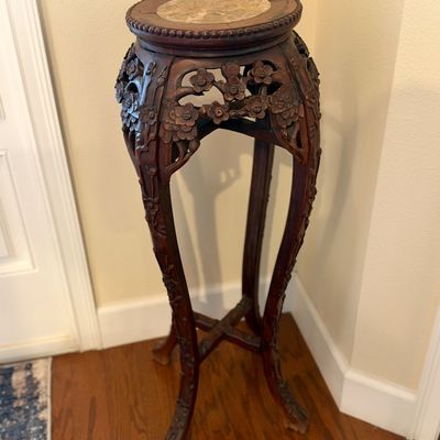 Sale Photo Thumbnail #16: Chinese carved rosewood plant stand featuring an inset marble top, 
