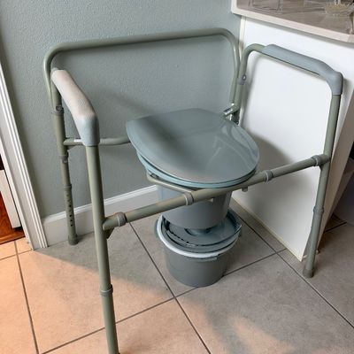 Sale Photo Thumbnail #110: Adjustable bedside commode chair 