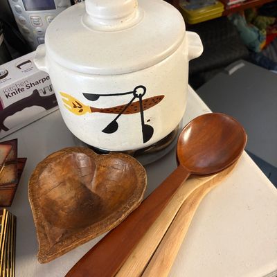 Vintage speckled ceramic lidded pot with a stylized kitchen utensil graphic, paired with a hand-carved wooden heart-shaped bowl and three...