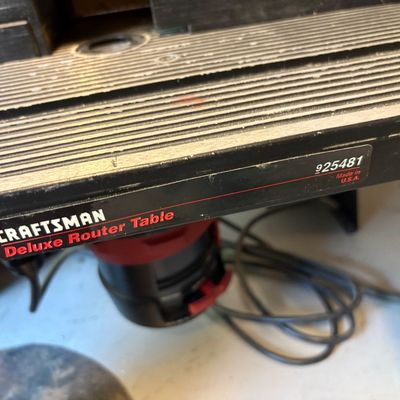 Craftsman Deluxe Router Table, model 925481, showing the ribbed metal tabletop and front branding label.