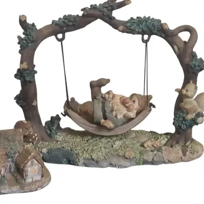 DO104 Vintage Gnome Figurine Resting In Hammock & Cottage Figurine 