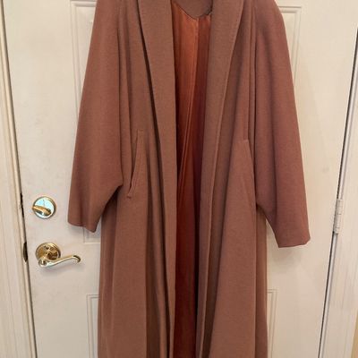 Sale Photo Thumbnail #177: Vintage wool swing coat featuring a shawl collar, satin lining, and side pockets.