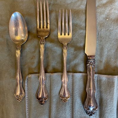 Sale Photo Thumbnail #158: Four-piece sterling silver place setting, including a teaspoon, dinner fork, salad fork, and dinner knife - pattern Westmoreland 