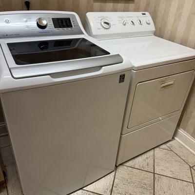 Sale Photo Thumbnail #169: white GE top-loading washing machine and Kenmore clothes dryer.