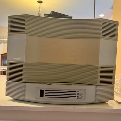 Sale Photo Thumbnail #161: Bose Acoustic Wave Music System with built-in multi-disc CD changer and top-mounted radio controls.
