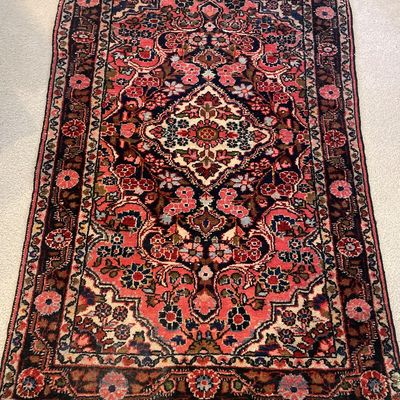 Sale Photo Thumbnail #26: Hand-knotted Persian area rug featuring a central diamond medallion, intricate floral patterns, and a palette of pink, navy, and cream.