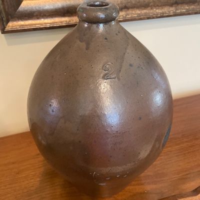 Sale Photo Thumbnail #47: Antique 2-gallon brown albany-slip glazed stoneware beehive jug featuring an embossed numeral 2 mark.