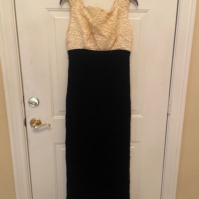 Sale Photo Thumbnail #178: Vintage floor-length evening gown featuring a cream floral lace bodice paired with a long black velvet skirt.