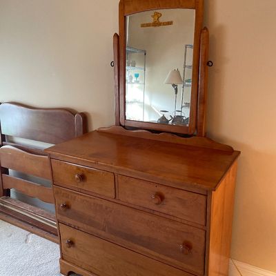Sale Photo Thumbnail #165: Vintage maple dresser with attached swivel mirror, accompanied by a matching twin bed frame.
