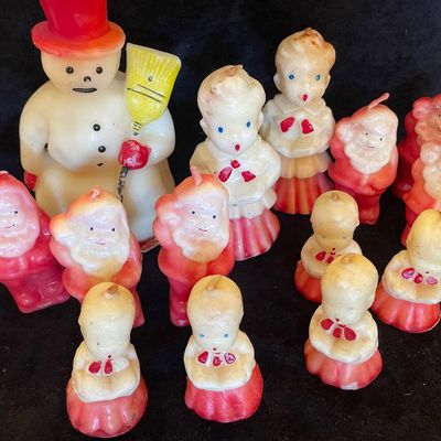 Sale Photo Thumbnail #96: Collection of vintage Christmas novelty wax candles featuring a snowman, Santas, and choir children.