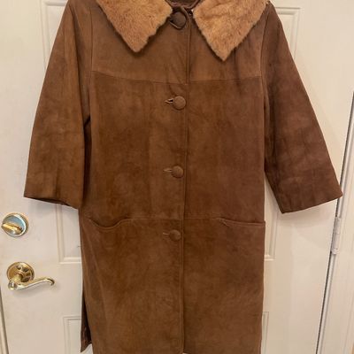 Sale Photo Thumbnail #180: Vintage brown suede women's coat with a plush fur collar and large covered front buttons.