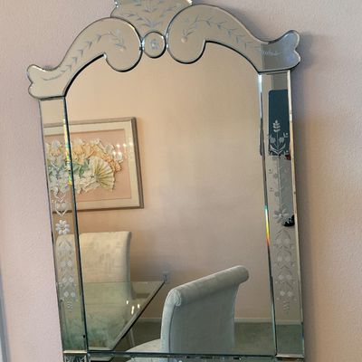 Sale Photo Thumbnail #5: Vintage Venetian-style etched glass wall mirror featuring a decorative arched crest and floral borders.