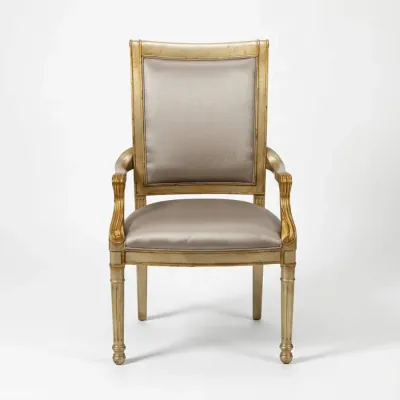 Sale Photo Thumbnail #43: Neoclassical style armchair featuring a gilded wooden frame with fluted legs and taupe satin upholstery.