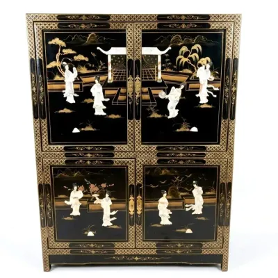Sale Photo Thumbnail #35: Chinese black lacquer cabinet featuring four doors adorned with hand-painted gilt details and mother-of-pearl inlaid figures in a traditional garden scene.