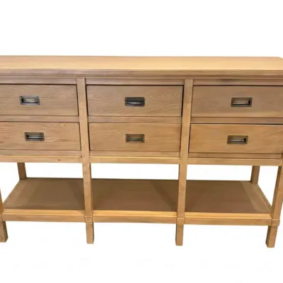 Sale Photo Thumbnail #61: Light oak console table featuring six drawers with recessed metal pulls and an open lower shelf.