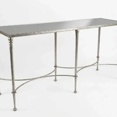 Sale Photo Thumbnail #50: Contemporary silver-gilt console table featuring a mirrored glass top, textured metal frame, and slender turned legs with curved stretchers.