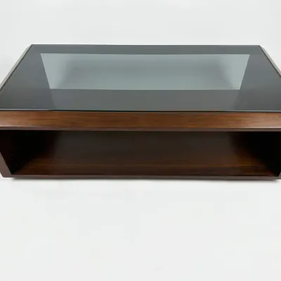 Sale Photo Thumbnail #53: Mid-century modern style walnut coffee table featuring a smoked glass top insert and an open lower storage shelf.