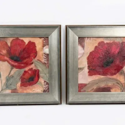 Sale Photo Thumbnail #44: Pair of contemporary floral oil paintings depicting red poppies, presented in matching wide silver-finished frames.