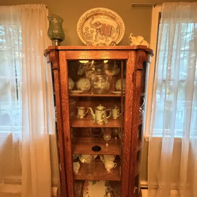 Antique oak display cabinet,  antique china.   