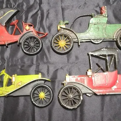 4 Piece Set Of Cast Metal Midwest Automobile Wall Hangings