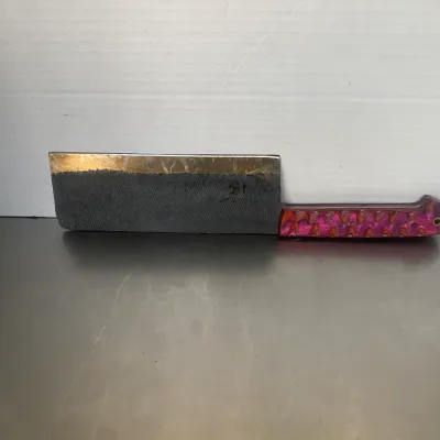 Sale Photo Thumbnail #45: Custom-made cleaver knife crafted from a metal file, featuring a textured blade and a vibrant pink and purple patterned handle.