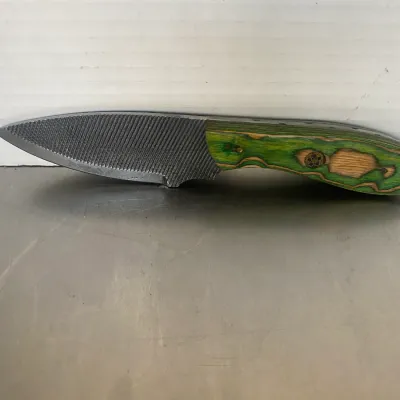 Sale Photo Thumbnail #52: Custom fixed-blade knife crafted from a metal file, featuring a green and natural wood laminated handle with a mosaic pin.