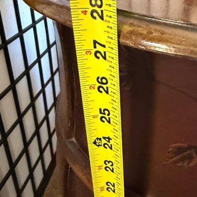 Sale Photo Thumbnail #180: A charming round wooden accent chest or nightstand featuring three curved drawers. The drawer fronts are finished in a deep burgundy/mauve tone and hand-painted with delicate bird and floral branch motifs. Features metal ring pull hardware. Shows some lig