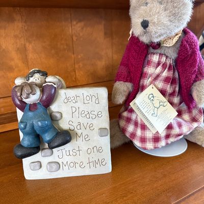 Sale Photo Thumbnail #159: A two-piece decorative lot featuring:
- A Boyds Bears & Friends plush teddy bear wearing a red and white plaid dress, a knit maroon cardigan sweater, and a lace collar. Includes original paper hang tag.
- A figurine depicting a boy climbing a wall with th