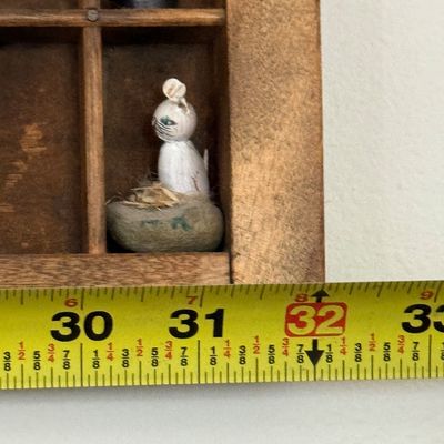 Sale Photo Thumbnail #198: A vintage wooden printer's type drawer repurposed as a hanging shadow box display case. Measures approximately 32 inches wide by 16.5 inches tall. The lot includes a large assortment of miniature collectibles, figurines, and novelty items as shown, includ