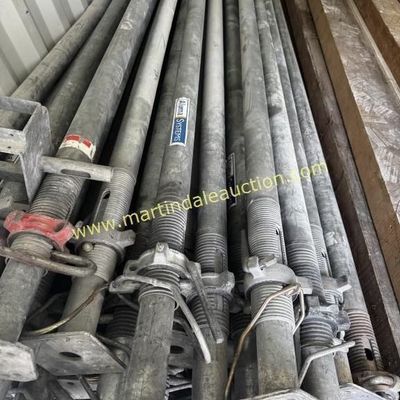 Sale Photo Thumbnail #26: Collection of Aluma Systems heavy-duty adjustable steel shoring posts, showing signs of industrial use.