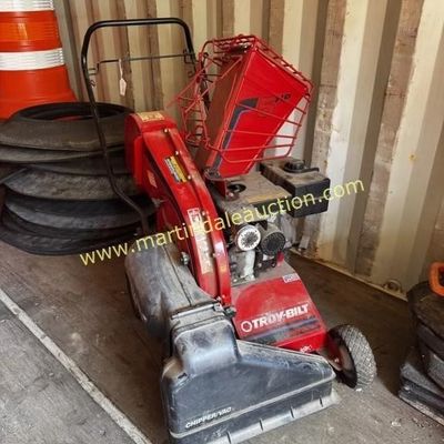 Sale Photo Thumbnail #33: Troy-Bilt 5 HP Chipper/Vac, showing some wear and dust from storage.