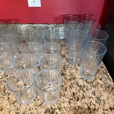 Sale Photo Thumbnail #203: Collection of vintage clear textured glassware, including tumblers and rocks glasses in a grid pattern.