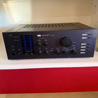 Sale Photo Thumbnail #281: Vintage Sansui AU-D7 integrated amplifier featuring a black faceplate, dual peak power level meters, and various control knobs, circa 1980s.
