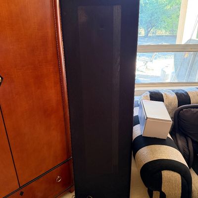 Sale Photo Thumbnail #149: Magneplanar electrostatic floor-standing speaker in a black fabric finish, showing some dust and wear from use.