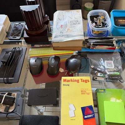 Assortment of office and computer accessories, including computer mice, USB flash drives, a box of Avery marking tags, and a copy of...