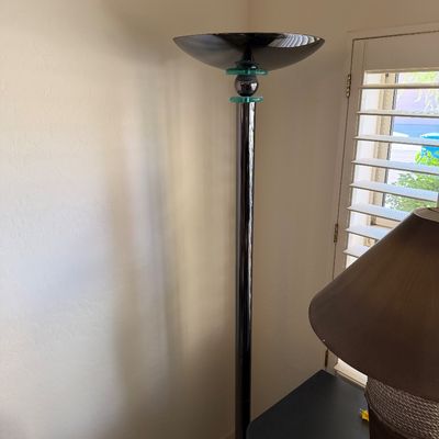 Sale Photo Thumbnail #310: Postmodern torchiere floor lamp featuring a chrome pole, black glass bowl shade, and teal glass accents, circa 1980s.