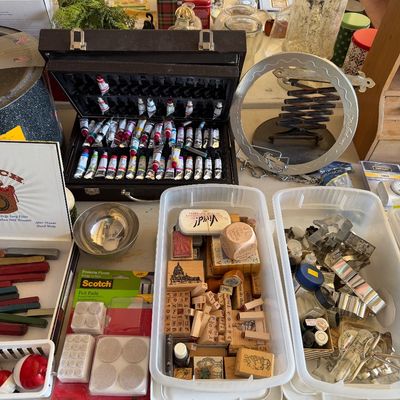 Sale Photo Thumbnail #99: Assorted crafting and hobby supplies, including a wooden box of paint tubes, rubber stamps in a plastic bin, cookie cutters, and Scotch felt pads.