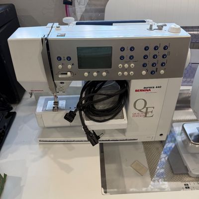 Sale Photo Thumbnail #45: Bernina Aurora 440 QE (Quilter's Edition) computerized sewing machine, complete with power cord and digital display panel.