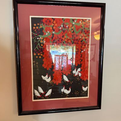 Sale Photo Thumbnail #75: Framed Chinese papercut art depicting white chickens under vibrant red foliage, presented in a black frame with a red mat.