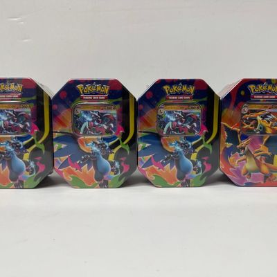 Sale Photo Thumbnail #36: Pokemon Trading Card Game Charizard Tins (Set of 4)