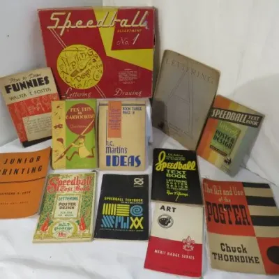 Collection of vintage lettering, cartooning, and poster design instruction books, including several Speedball textbooks and a Speedball...