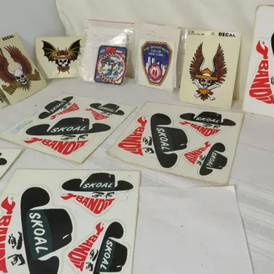 Collection of vintage decals and patches, featuring Skoal Bandit, Harley-Davidson, and FDNY designs from the 1980s.