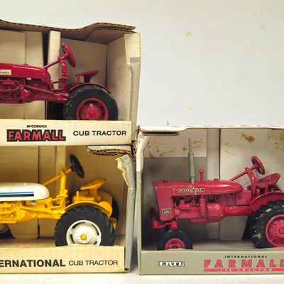 (3) International Cub Tractors