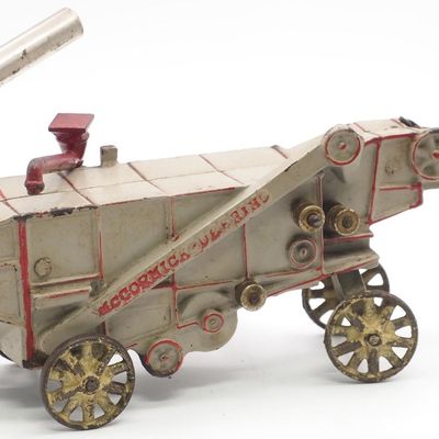 Sale Photo Thumbnail #65: Arcade McCormick Deering cast iron thresher