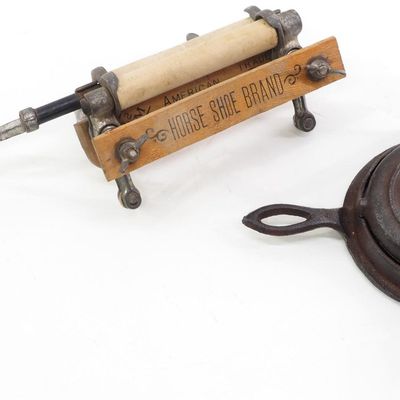 Sale Photo Thumbnail #428: Horseshoe wringer / EC Simmons waffle iron