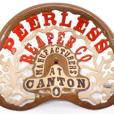 Sale Photo Thumbnail #700: Peerless Reaper Co. cast iron seat