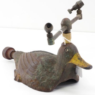 Sale Photo Thumbnail #492: Cast iron duck-shaped sprinkler
