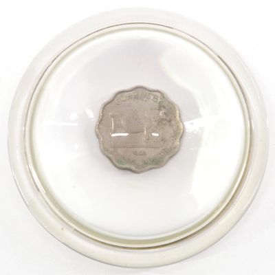 Sale Photo Thumbnail #2: 1959 Guernsey 3-pence glass paperweight