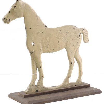Sale Photo Thumbnail #673: Cast iron short-tail horse windmill weight